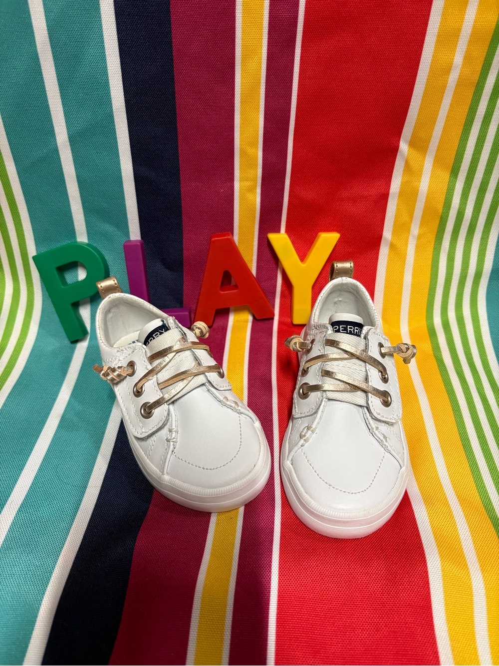 Sperry White Kids Slip-On Sneakers with Gold Accents